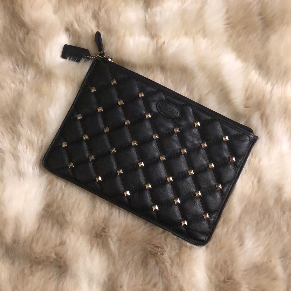 ⬇️‼️COACH leather clutch with studs
